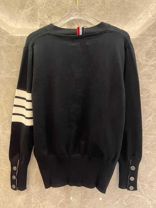 Thom Browne black wool cardigan with signature stripes