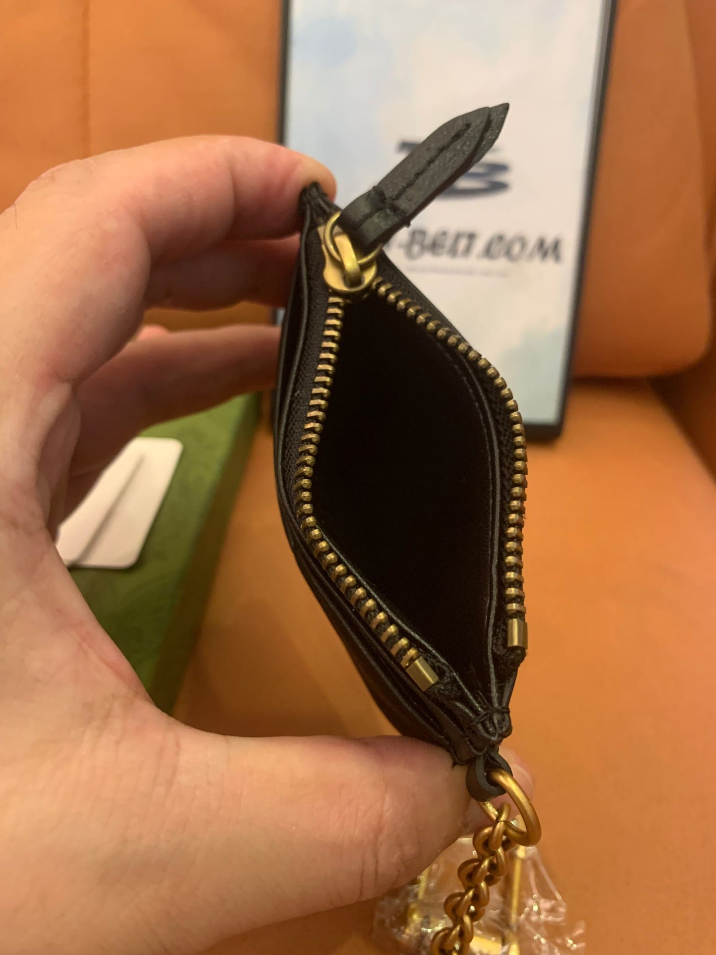 Tarjetero de piel Gucci GG Marmont con cadena
