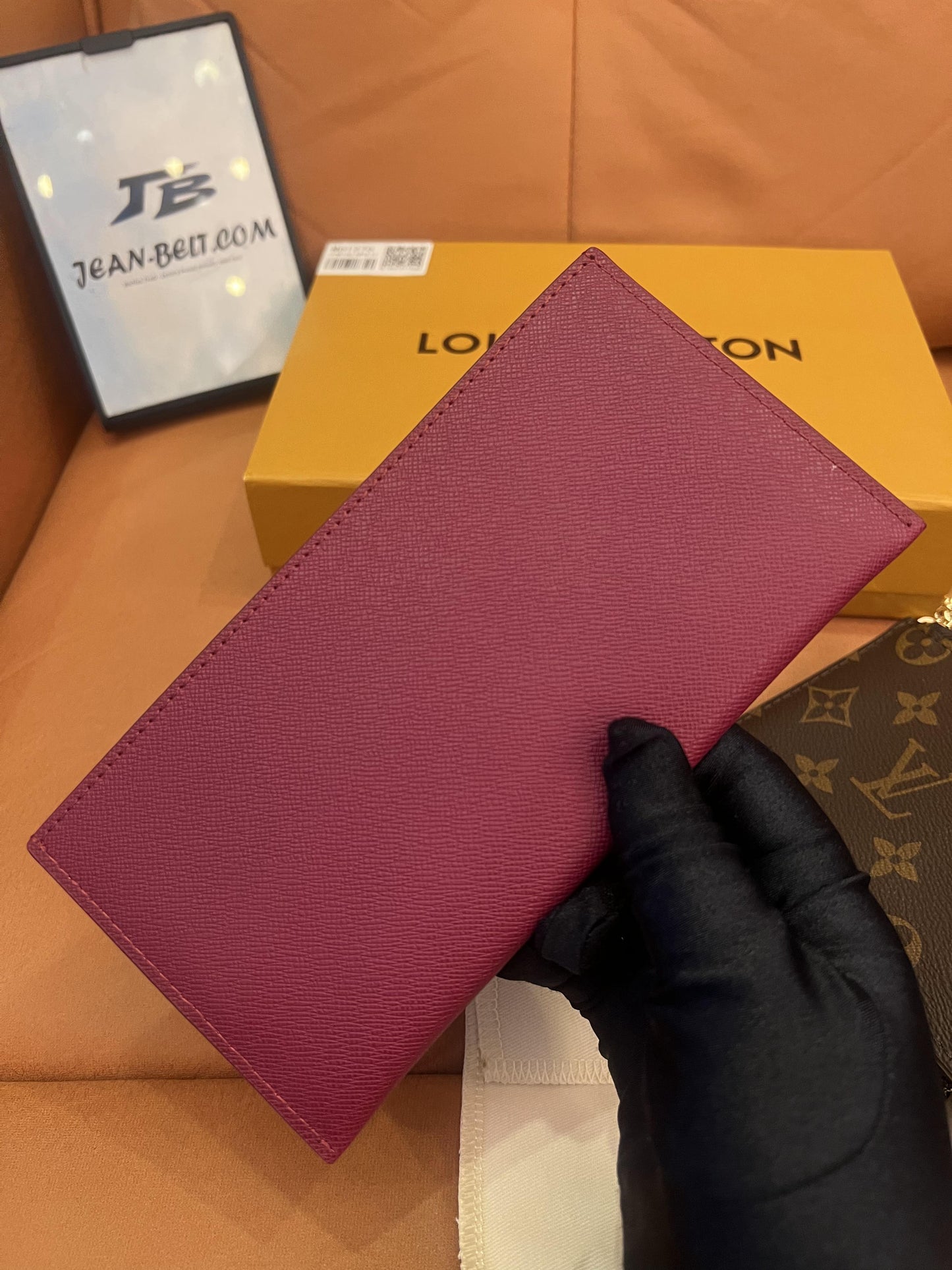 Cartera con cadena Felicie y pochette con monograma de Louis Vuitton fucsia