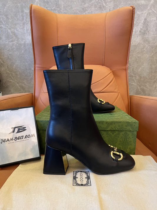 Botines Gucci de tacón medio con diseño de caballo para mujer