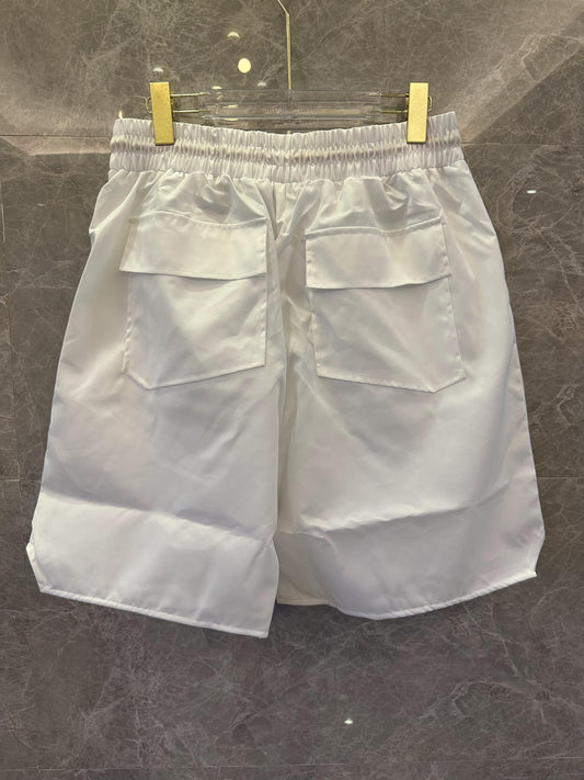 Bañador Rhude blanco con estampado tropical y cordón ajustable