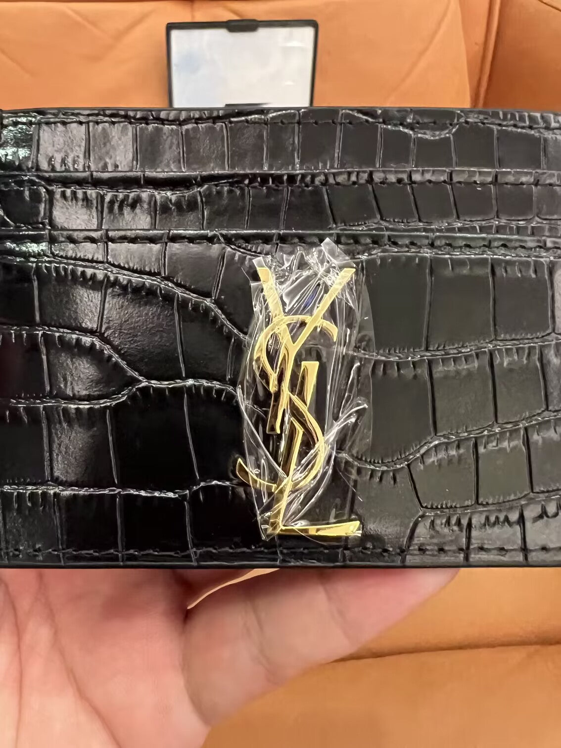 Saint Laurent monogram crocodile-embossed card holder in black