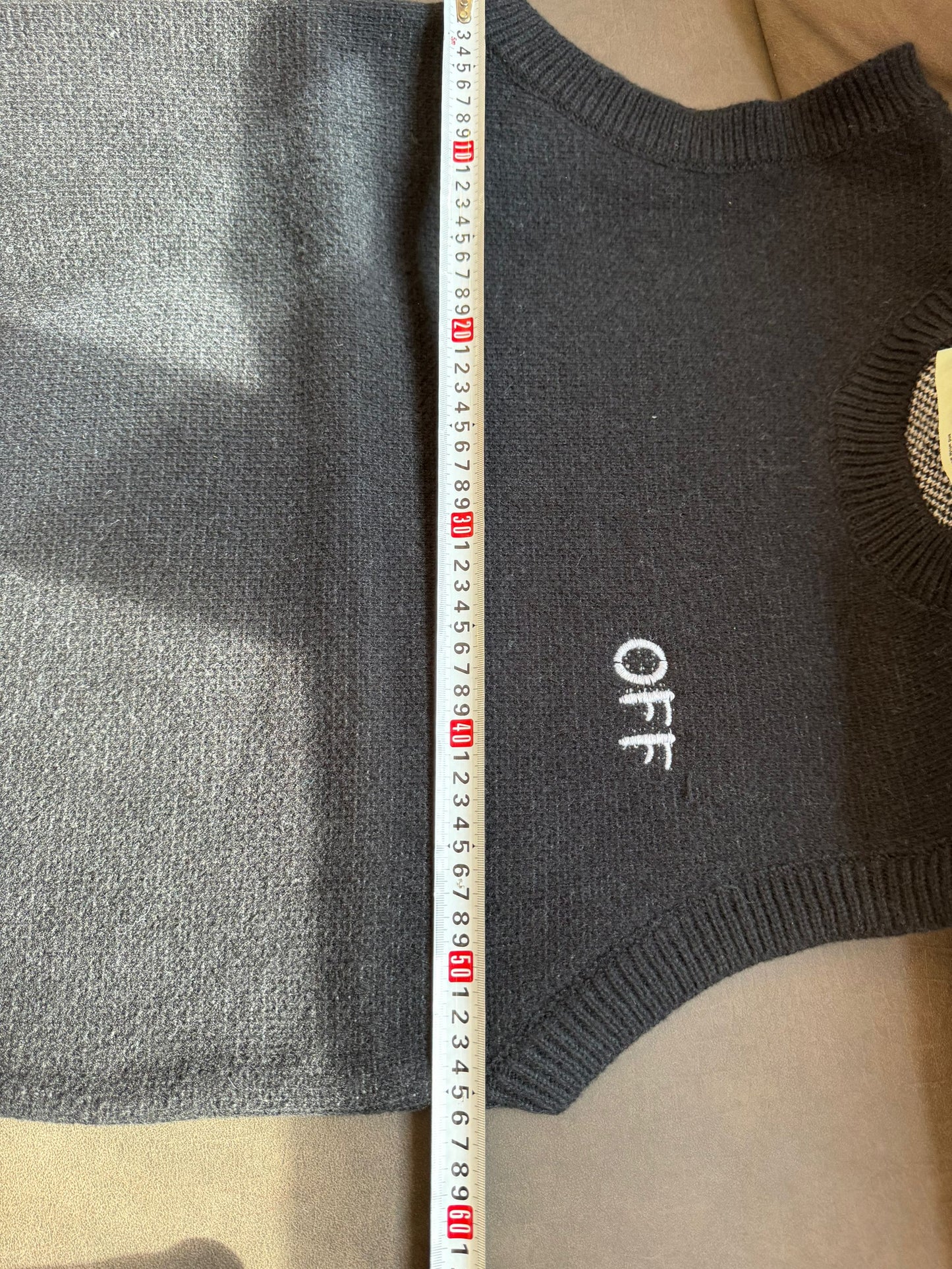 Off-White black knit vest with iconic arrows design