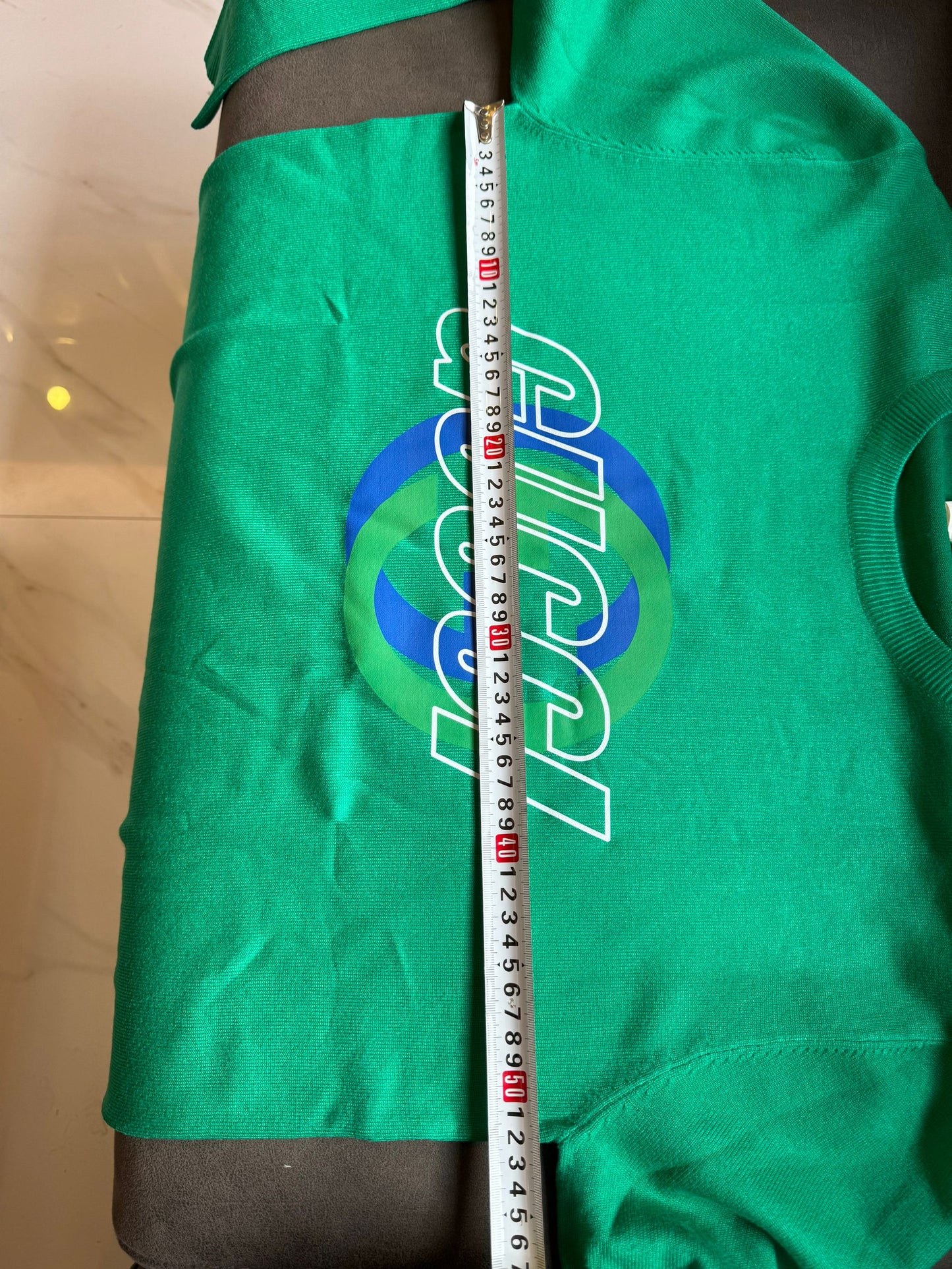 Suéter de punto con el logotipo verde de Gucci