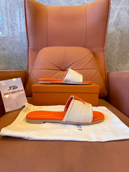 Sandalias planas capri Louis Vuitton LV en color naranja