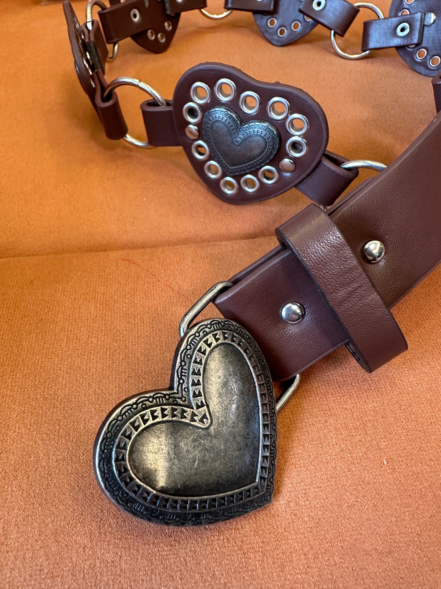 Vintage Heart Shaped Buckle Leather Belt with Metal Rings and Studded Detail