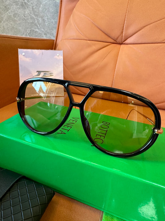 Bottega Veneta BV1273S 001 Black Frame Sunglasses with Gold Metal Temples and Amber Gradient Lenses