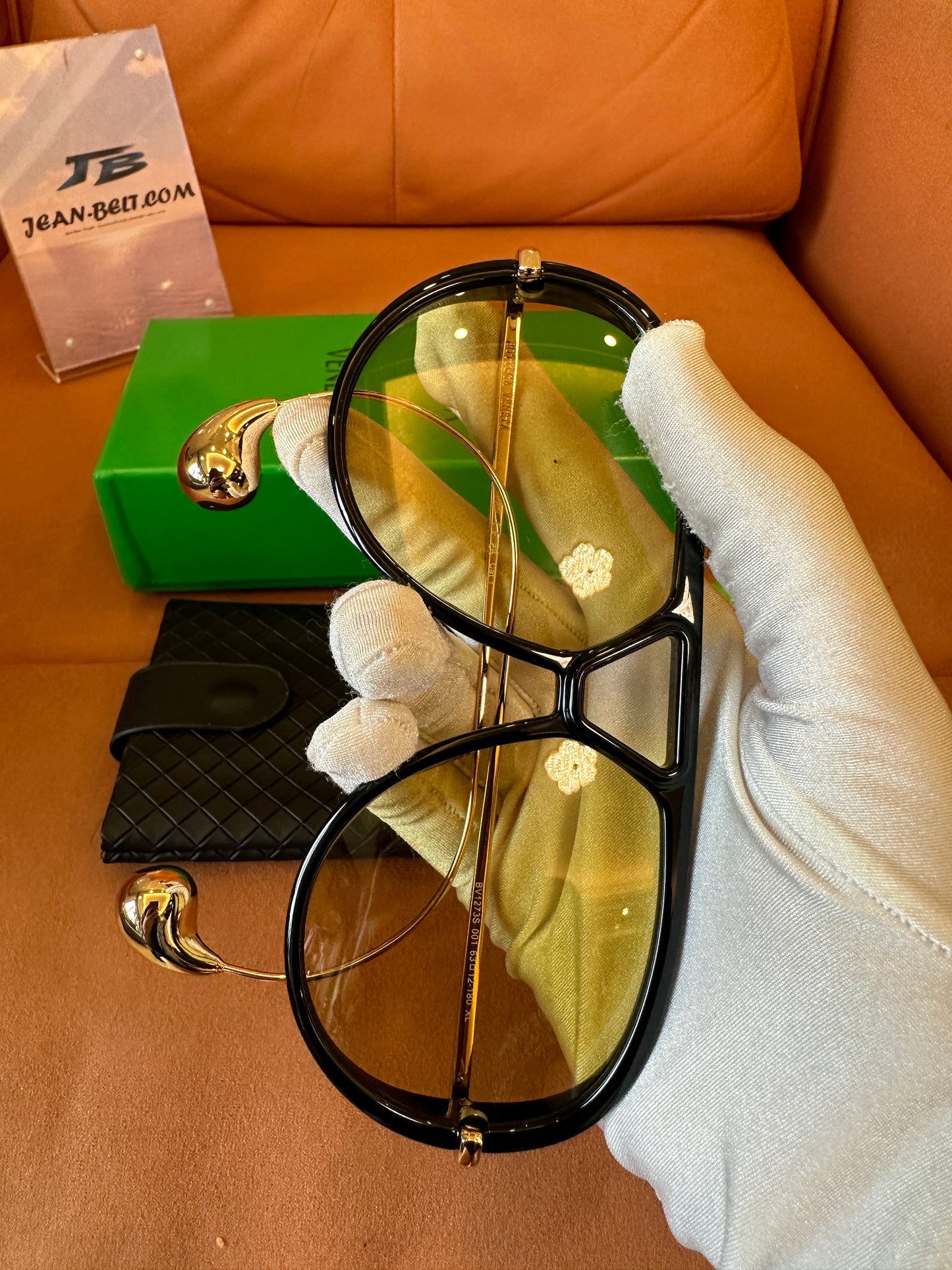 Bottega Veneta BV1273S 001 Black Frame Sunglasses with Gold Metal Temples and Amber Gradient Lenses