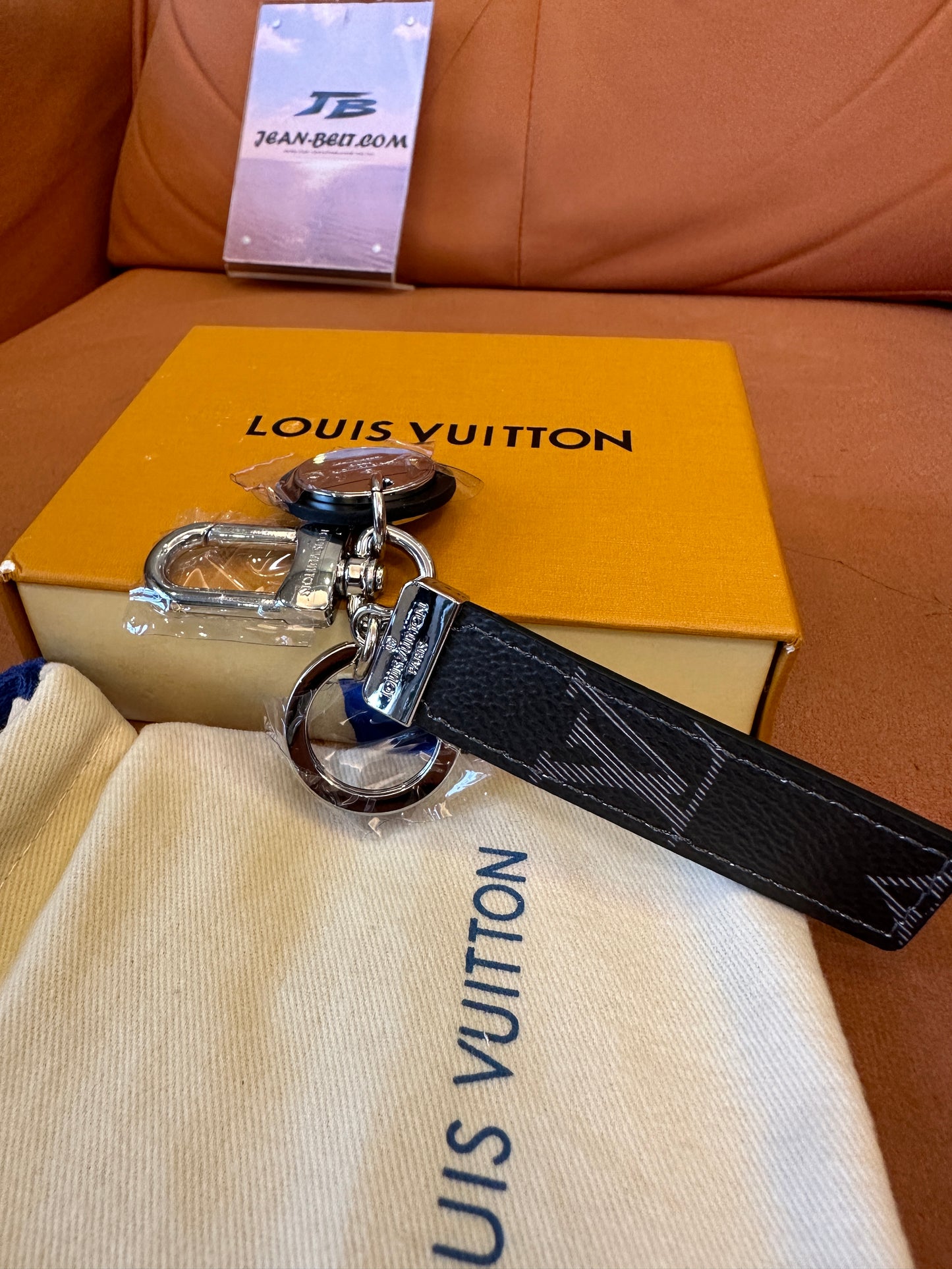 Louis Vuitton Dual-Sided Key Holder with Monogram Charm – Grey & Black Leather Strap
