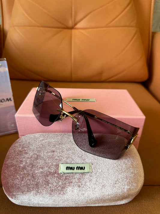Miu Miu MU54YS 5AK06I rimless sunglasses – gradient brown shield with gold logo