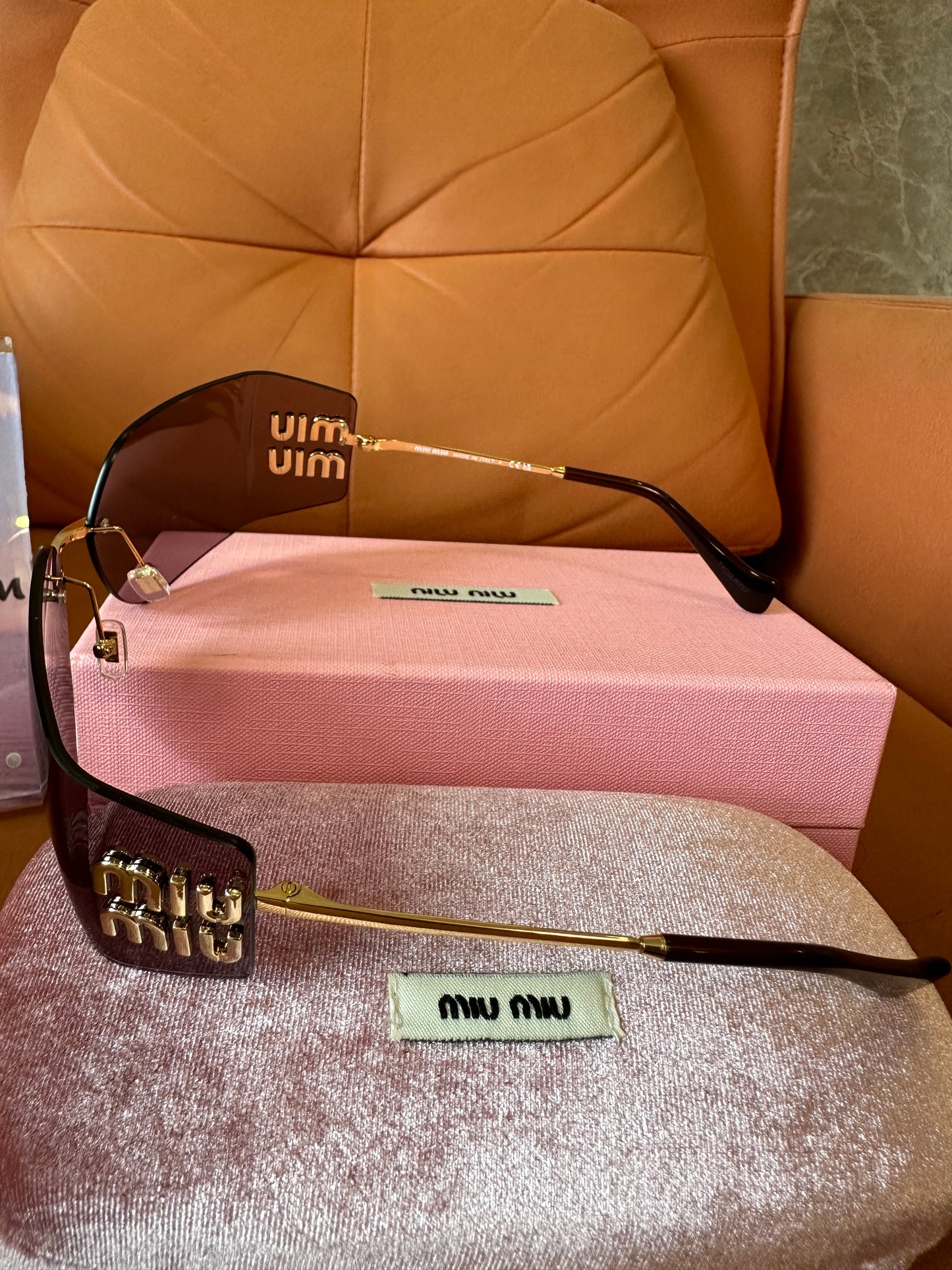 Miu Miu MU54YS 5AK06I rimless sunglasses – gradient brown shield with gold logo
