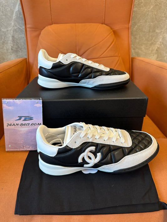 Chanel Quilted Black White Low Top Sneakers