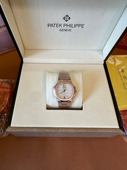 Patek Philippe Nautilus 7118/1R-001 Automatic Watch – Rose Gold with White Textured Dial