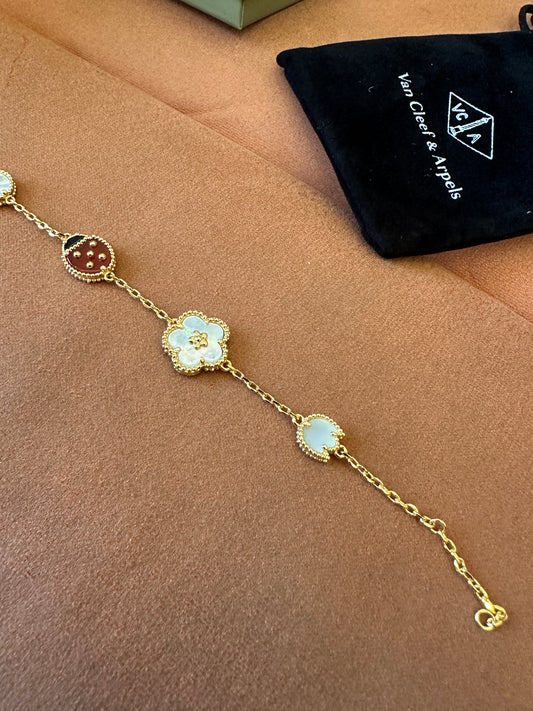 Van Cleef & Arpels Lucky Spring Bracelet – 18K Yellow Gold, Mother of Pearl & Carnelian