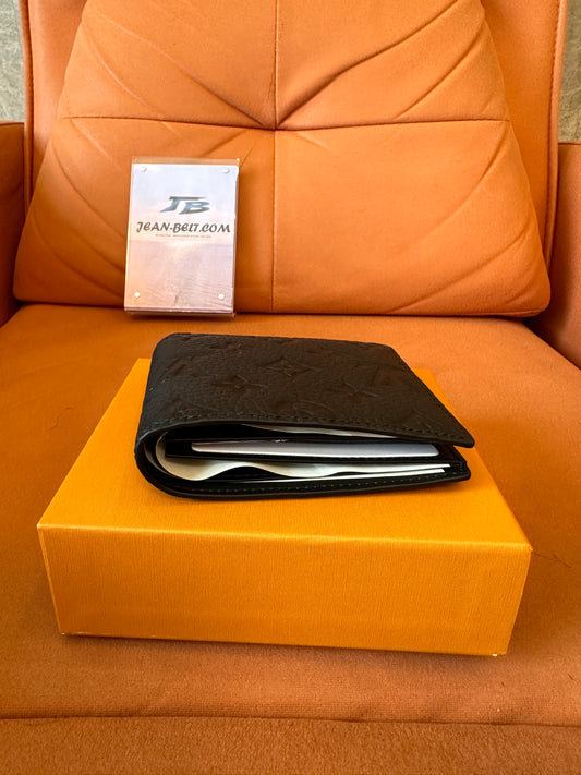 Cartera plegable de piel con monograma empreinte de Louis Vuitton