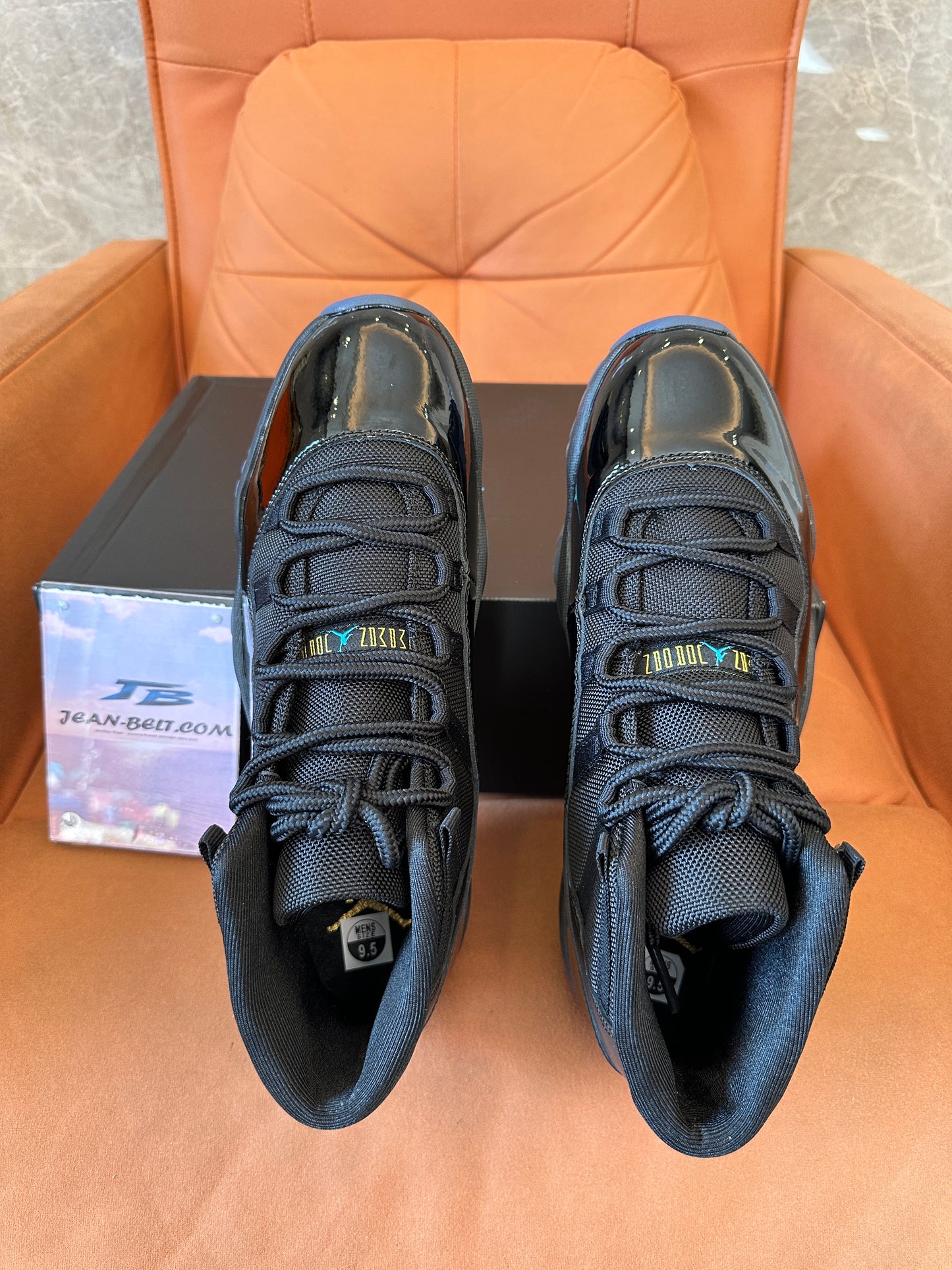 Air Jordan 11 Retro “Gamma Blue” Black Patent Leather Sneakers