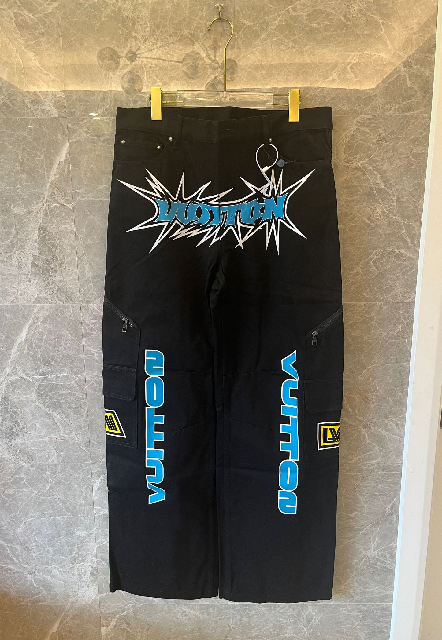 Calça jeans estampada de corrida Louis Vuitton