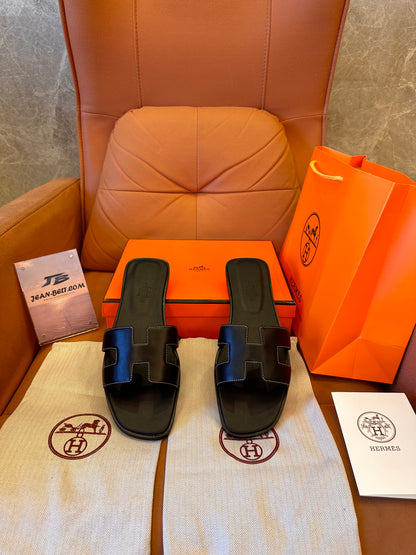 Sandalias Hermes naranjas y negras