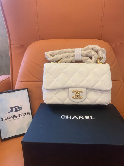 Bolso mini con solapa Chanel CF Classic en oro blanco