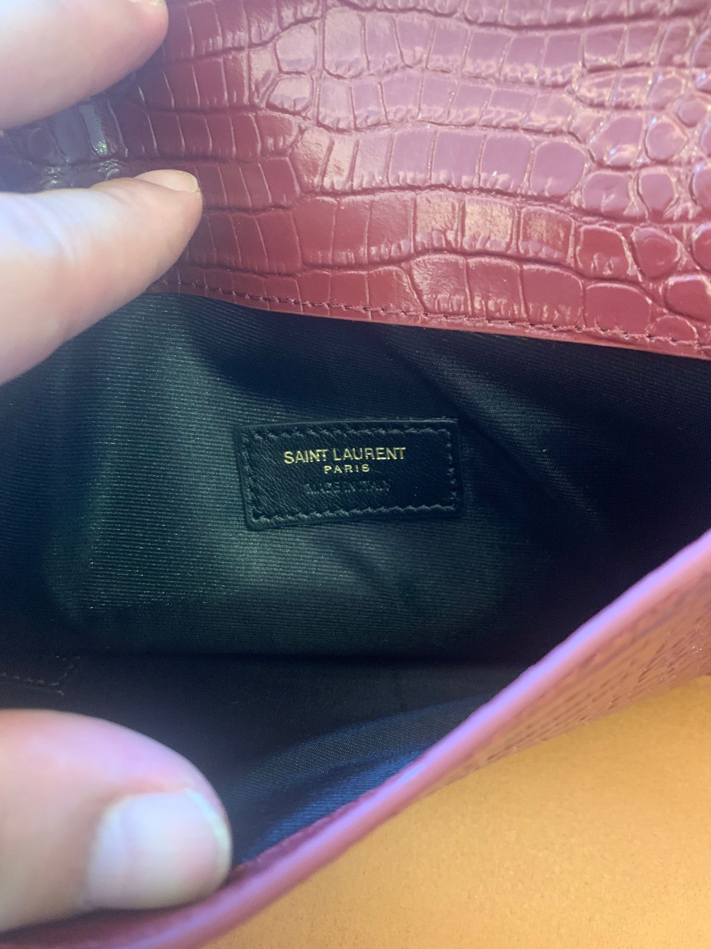 Saint Laurent uptown croc-embossed leather pouch
