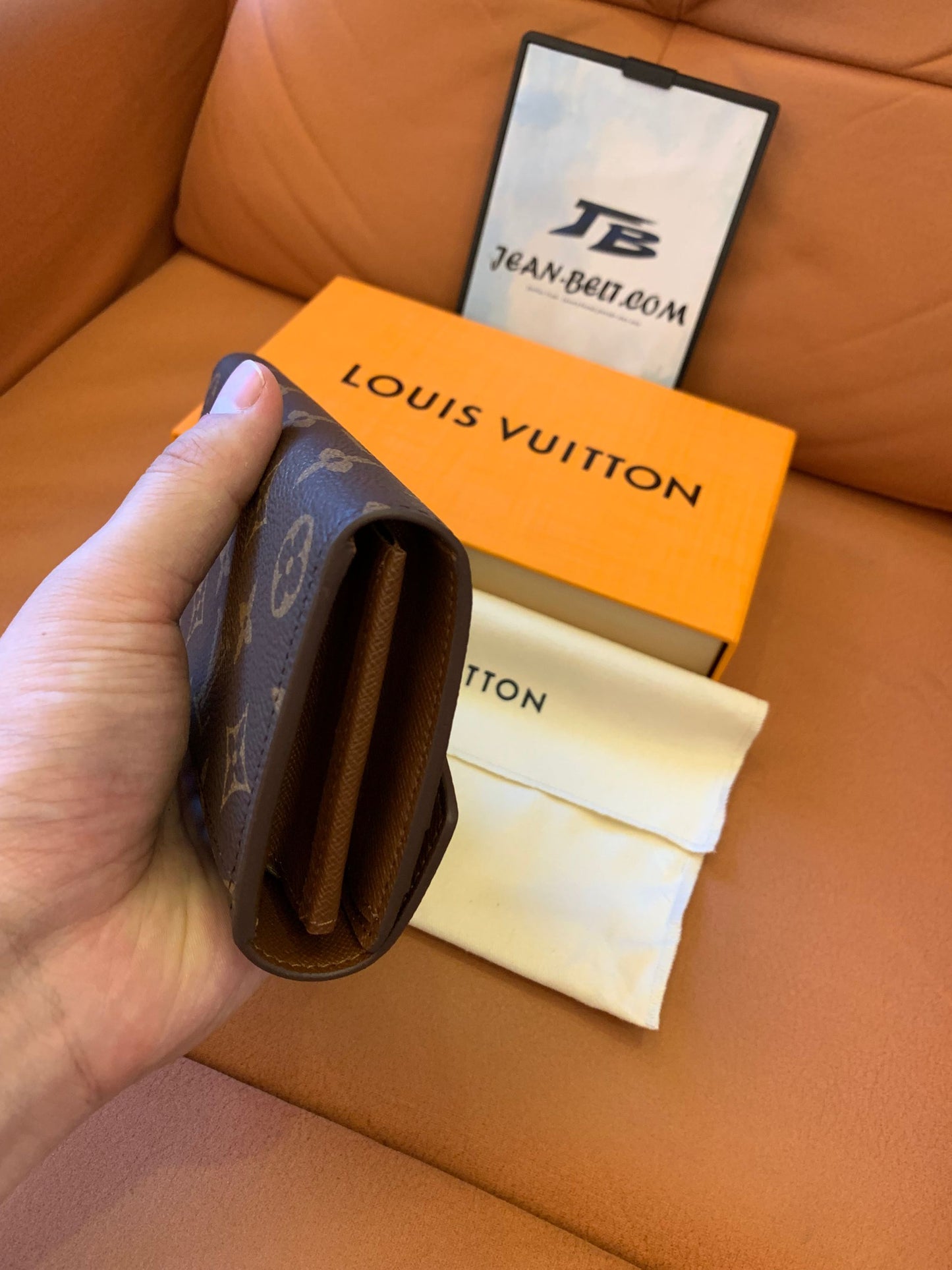Louis Vuitton monogram canvas wallet with envelope flap