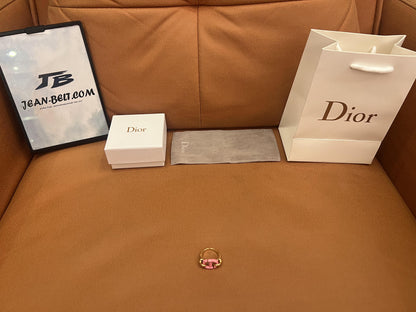 Anel Dior CD em esmalte rosa e tom dourado