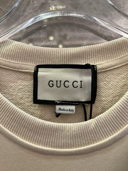 Moletom com logo gráfico da Gucci em creme