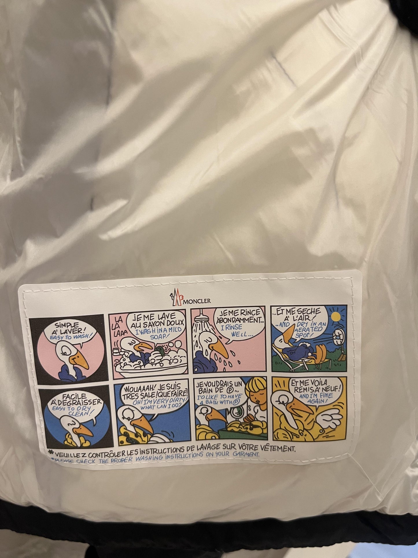 Moncler black puffer jacket with large back logo