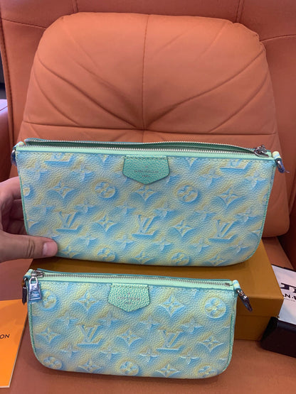 Louis Vuitton monograma empreinte verão stardust multi pochette