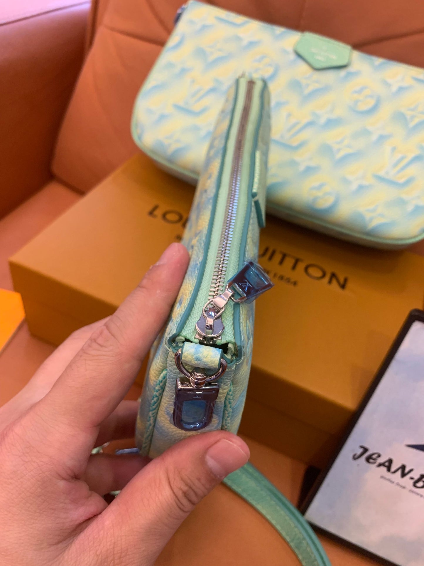 Louis Vuitton monograma empreinte verão stardust multi pochette