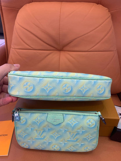 Louis Vuitton monograma empreinte verão stardust multi pochette