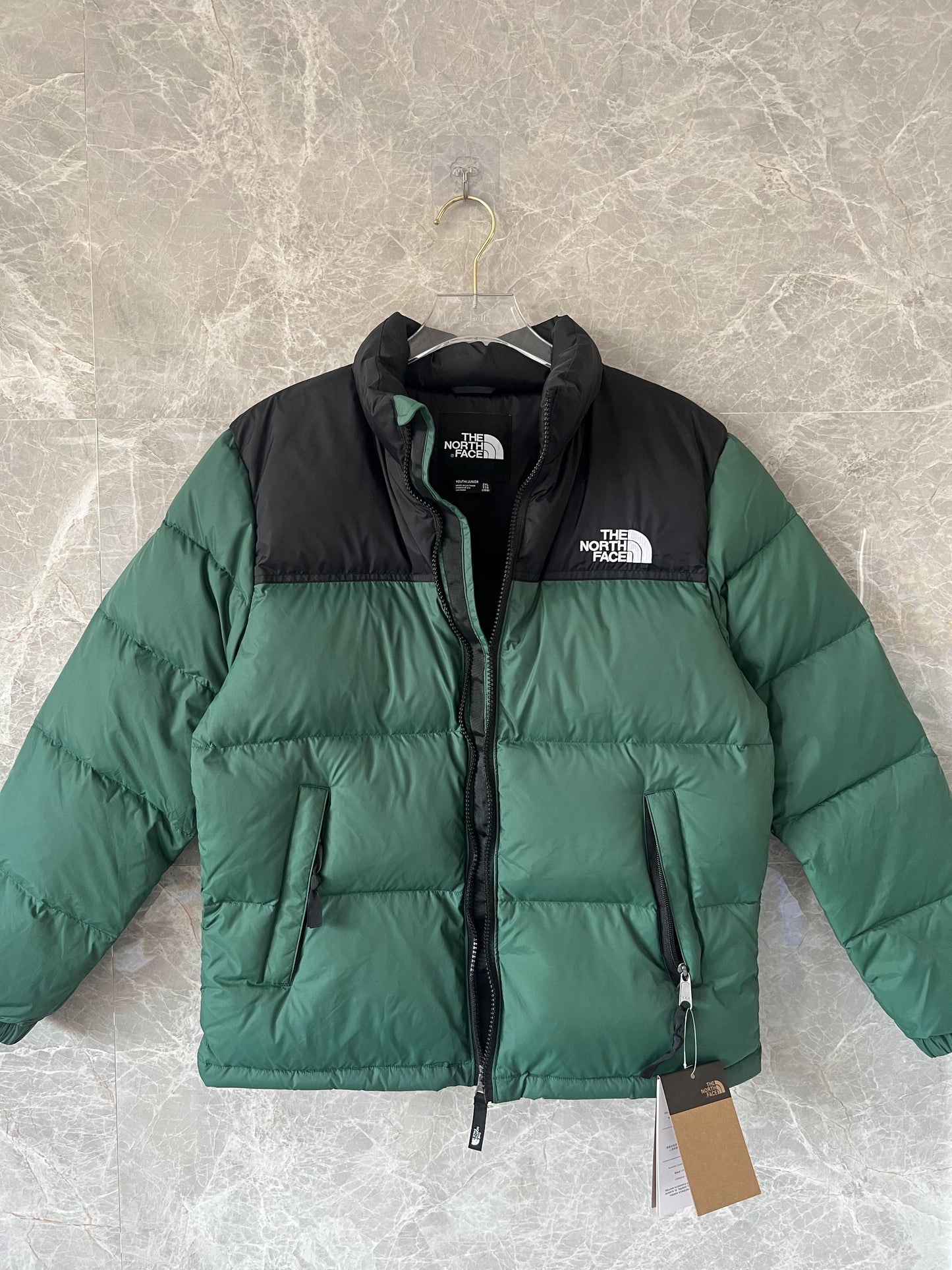 The North Face men's green down jacket