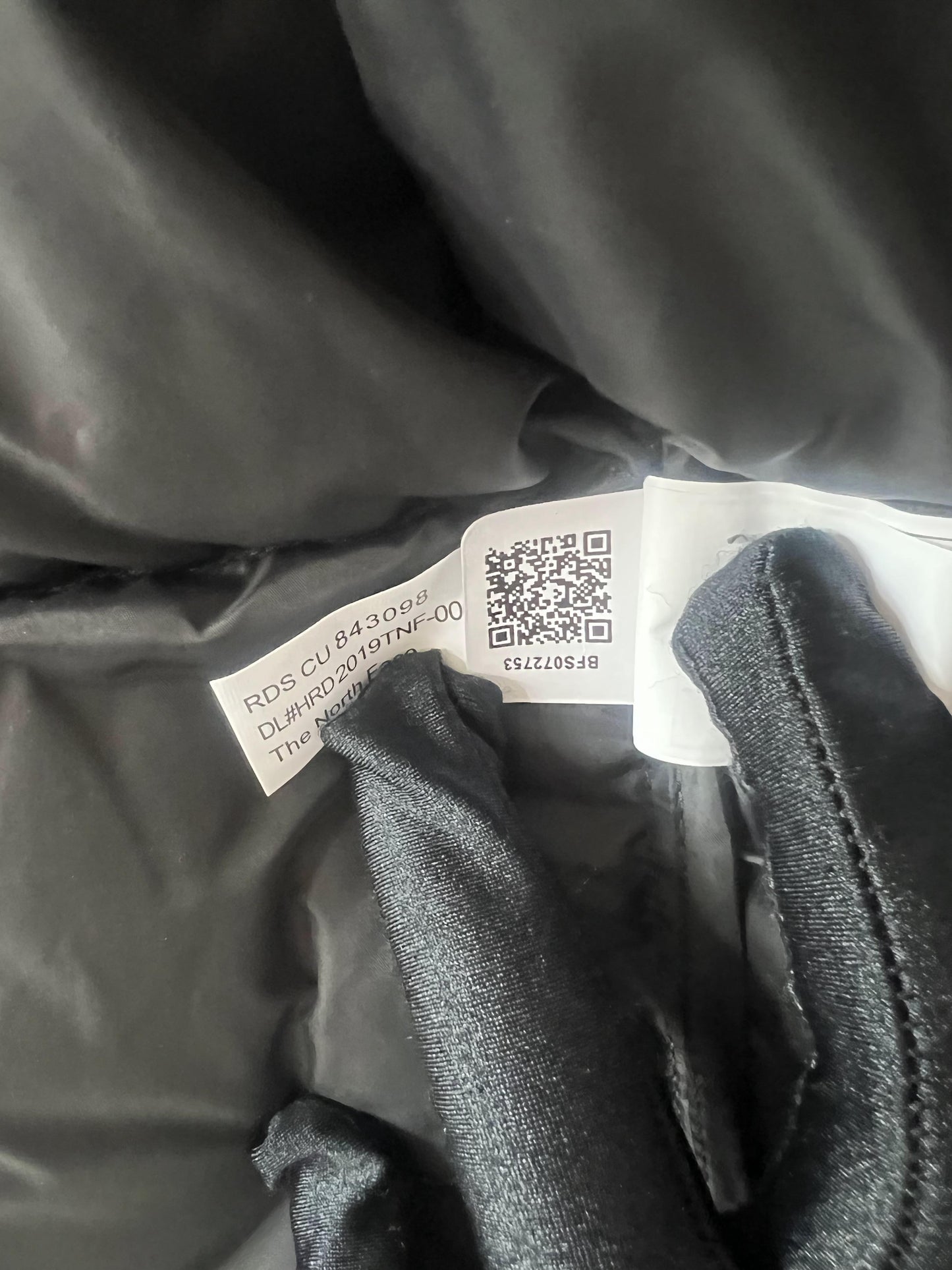 The North Face men's green down jacket