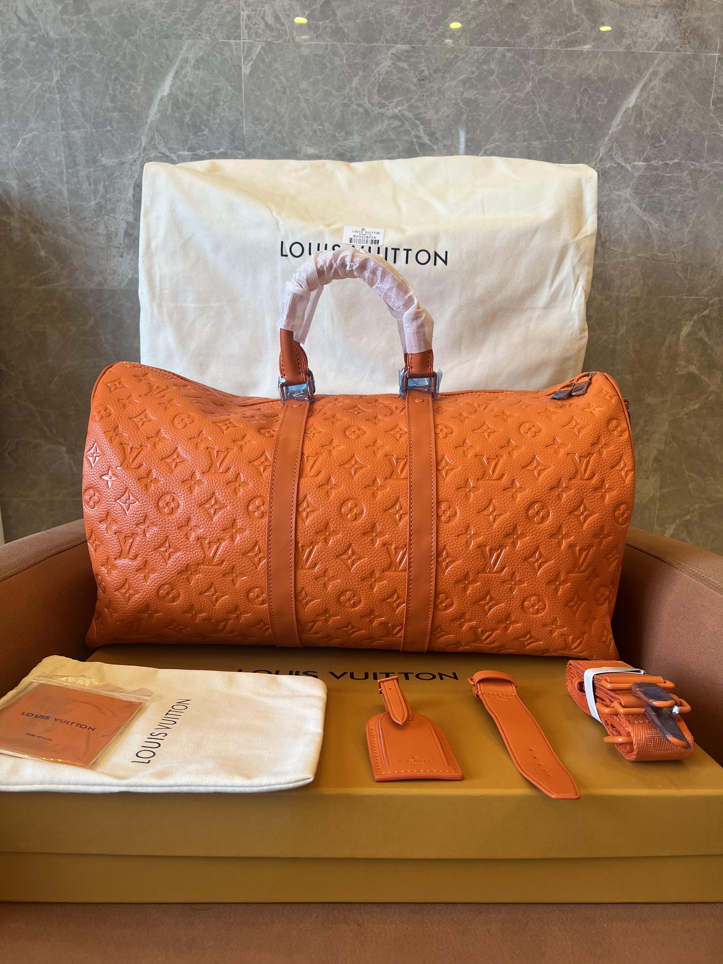 Bolsa de viagem Louis Vuitton Keepall Bandouliere 50 laranja para fim de semana