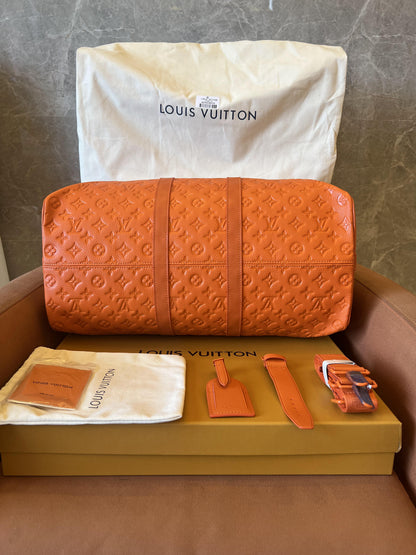 Bolsa de viagem Louis Vuitton Keepall Bandouliere 50 laranja para fim de semana
