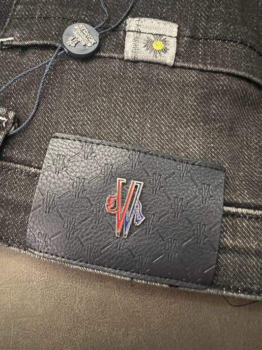 Calça jeans preta desgastada em colaboração Moncler x Evisu