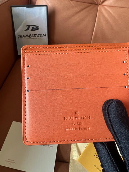 Carteira compacta de couro Louis Vuitton Taurillon na cor laranja