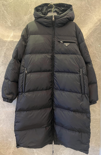 Prada down jacket with fur-trimmed hood in black