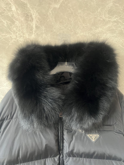 Prada down jacket with fur-trimmed hood in black