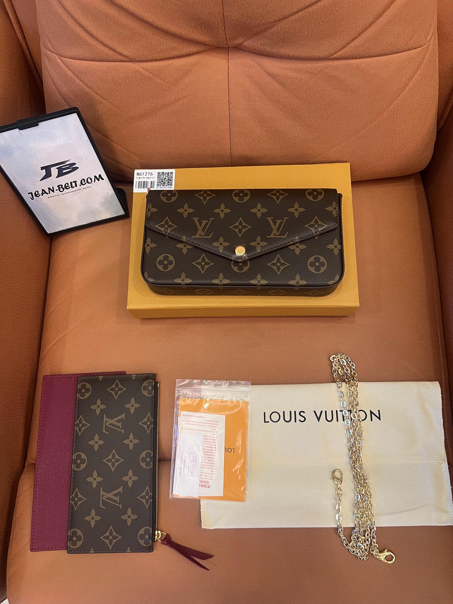 Cartera con cadena Felicie y pochette con monograma de Louis Vuitton fucsia