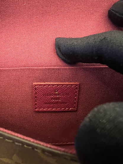 Cartera con cadena Felicie y pochette con monograma de Louis Vuitton fucsia