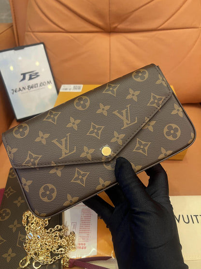 Cartera con cadena Felicie y pochette con monograma de Louis Vuitton fucsia