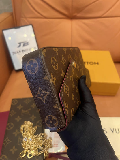 Cartera con cadena Felicie y pochette con monograma de Louis Vuitton fucsia