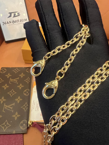 Cartera con cadena Felicie y pochette con monograma de Louis Vuitton fucsia
