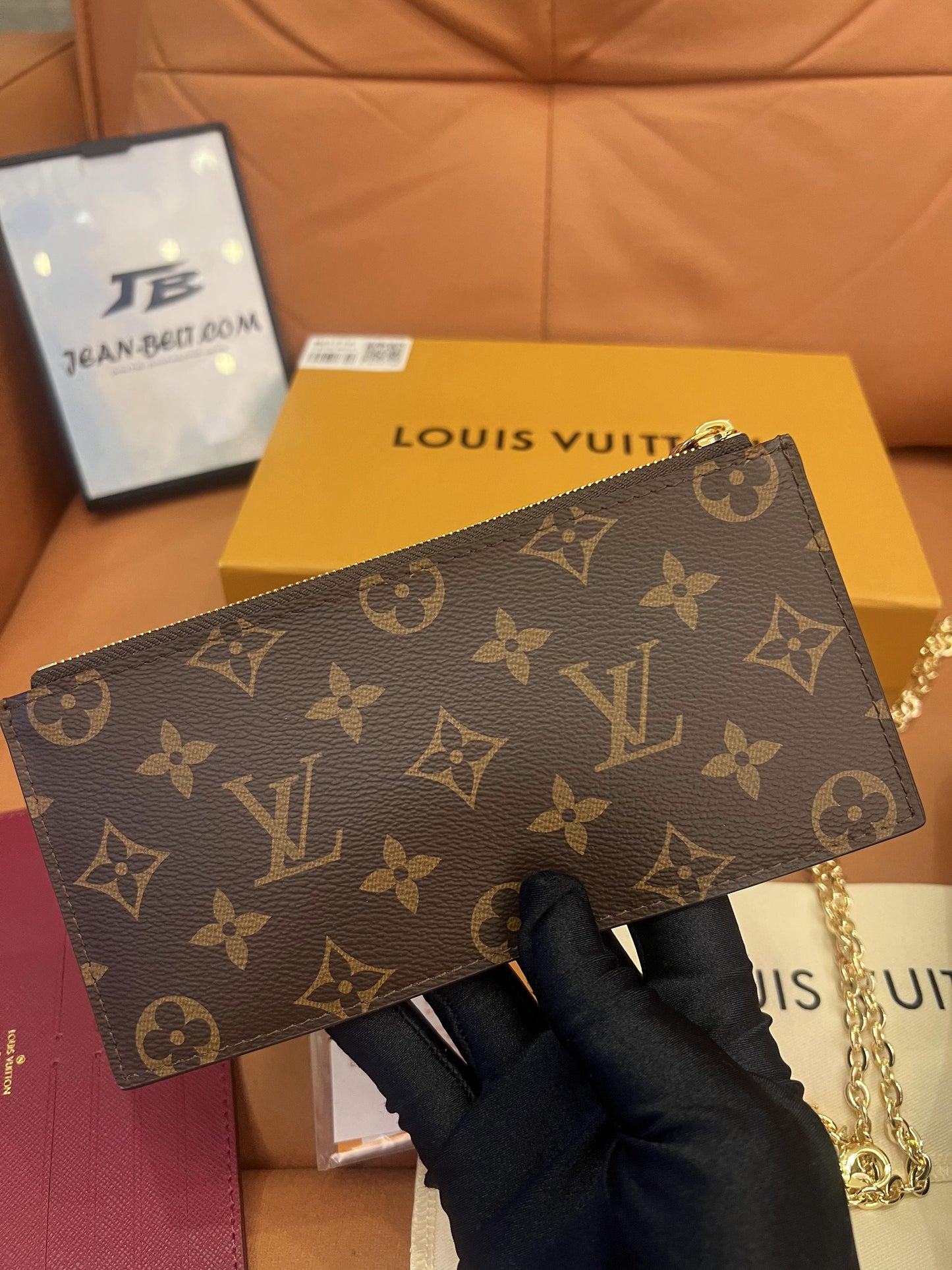 Cartera con cadena Felicie y pochette con monograma de Louis Vuitton fucsia