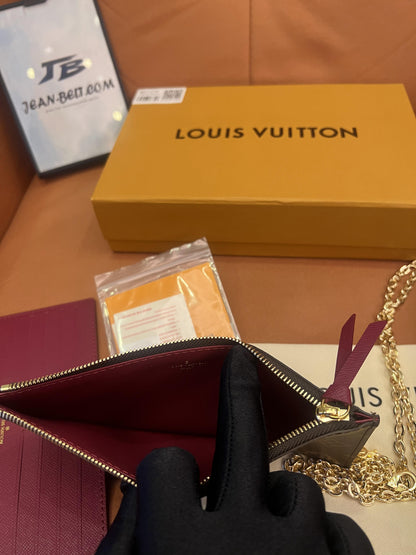 Cartera con cadena Felicie y pochette con monograma de Louis Vuitton fucsia