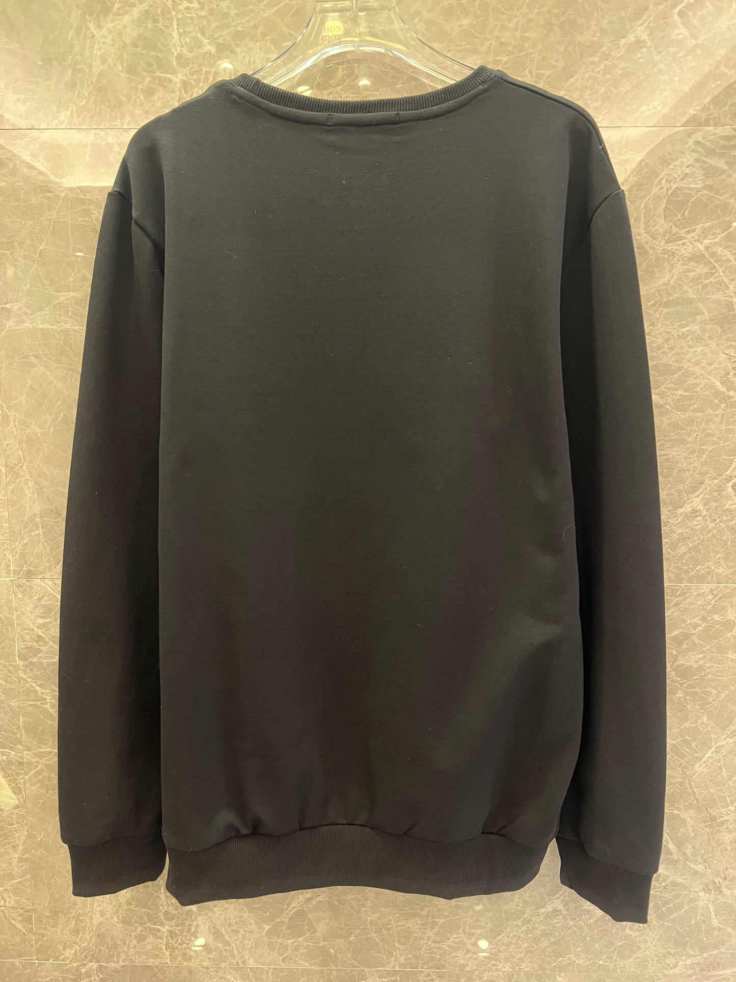 Conjunto de sudadera y joggers negros de Balmain Paris: ropa de estar por casa de lujo