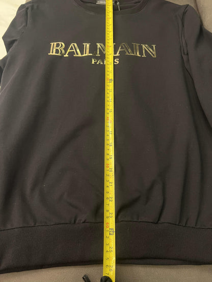 Conjunto de sudadera y joggers negros de Balmain Paris: ropa de estar por casa de lujo