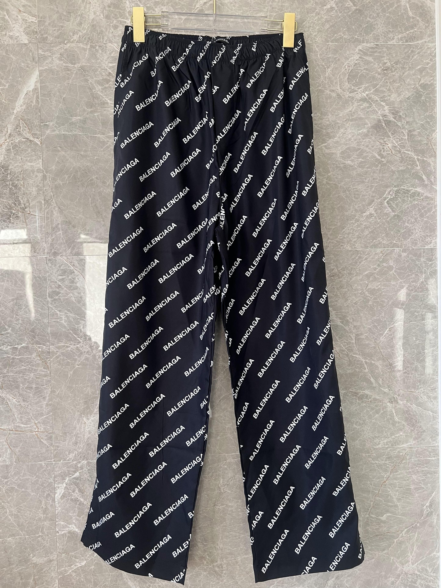 Balenciaga All-Over Logo Track Pants in Black