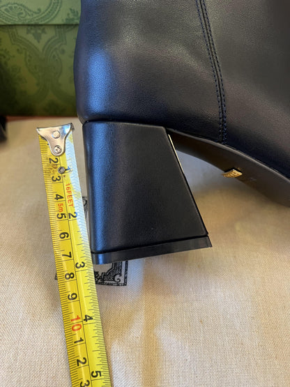 Botines Gucci de tacón medio con diseño de caballo para mujer